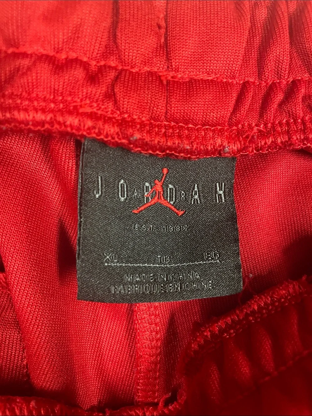 Jordan mens Red Track Joggers with Black Side Logo Tape XL